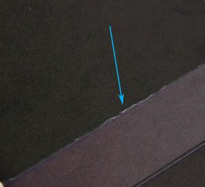 When folded improperly, with the hinge on the outside of the fold, cracking is likely.