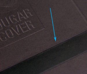 Critical to the functionality of any score is making certain that the hinge is on the inside of the score.  The hinge is the raised area created by the score.